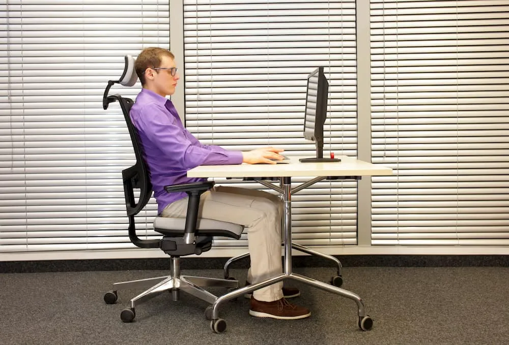 Wide desk scene with notebooks and muted peripherals arranged neatly